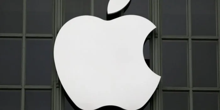 Apple logo on a dark building facade