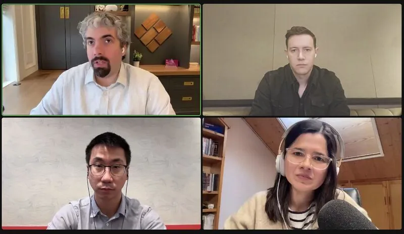 Video-call screenshot of four participants, no names shown