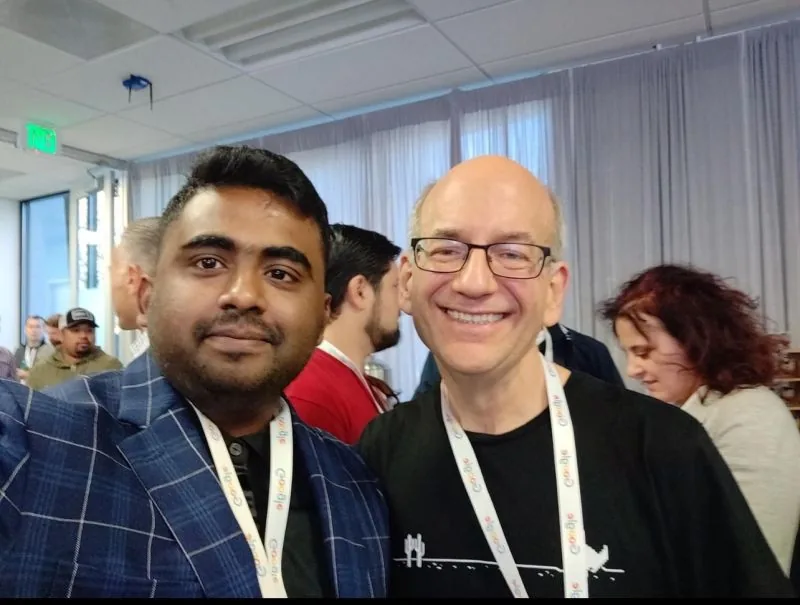 Selfie with a bald attendee in glasses (repost of 0040)