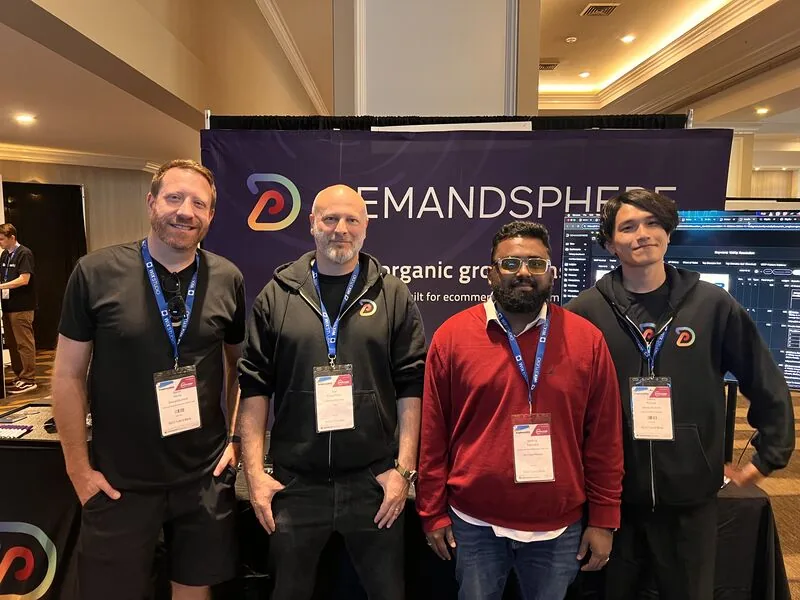 Four men including Venkata at DemandSphere booth